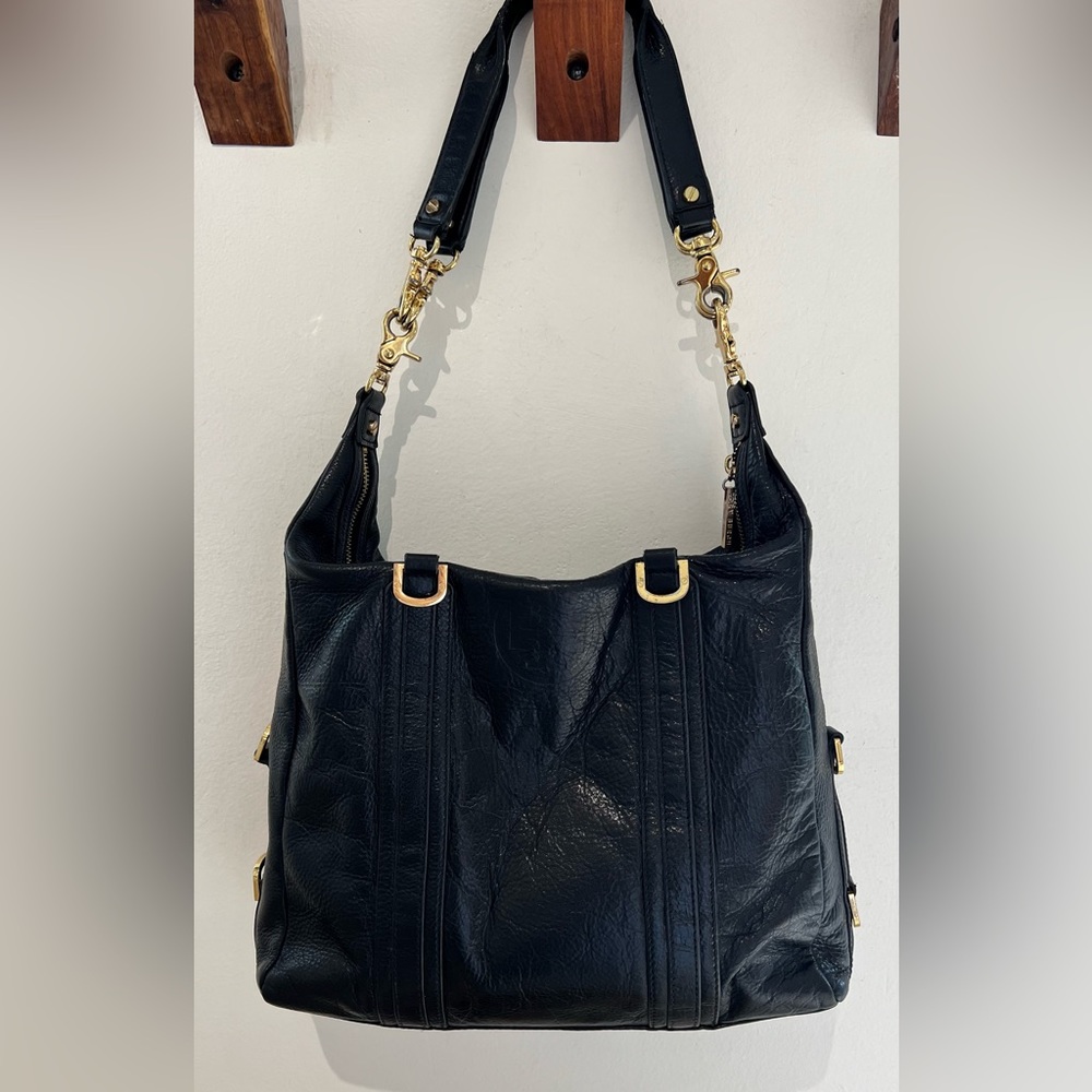 Vintage Tory Burch Convertible Leather bag.